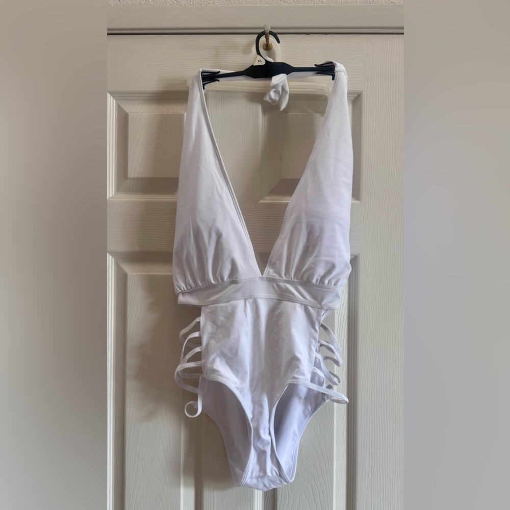 Women's White Plunge One-Piece Swimsuit with Side Strap Details